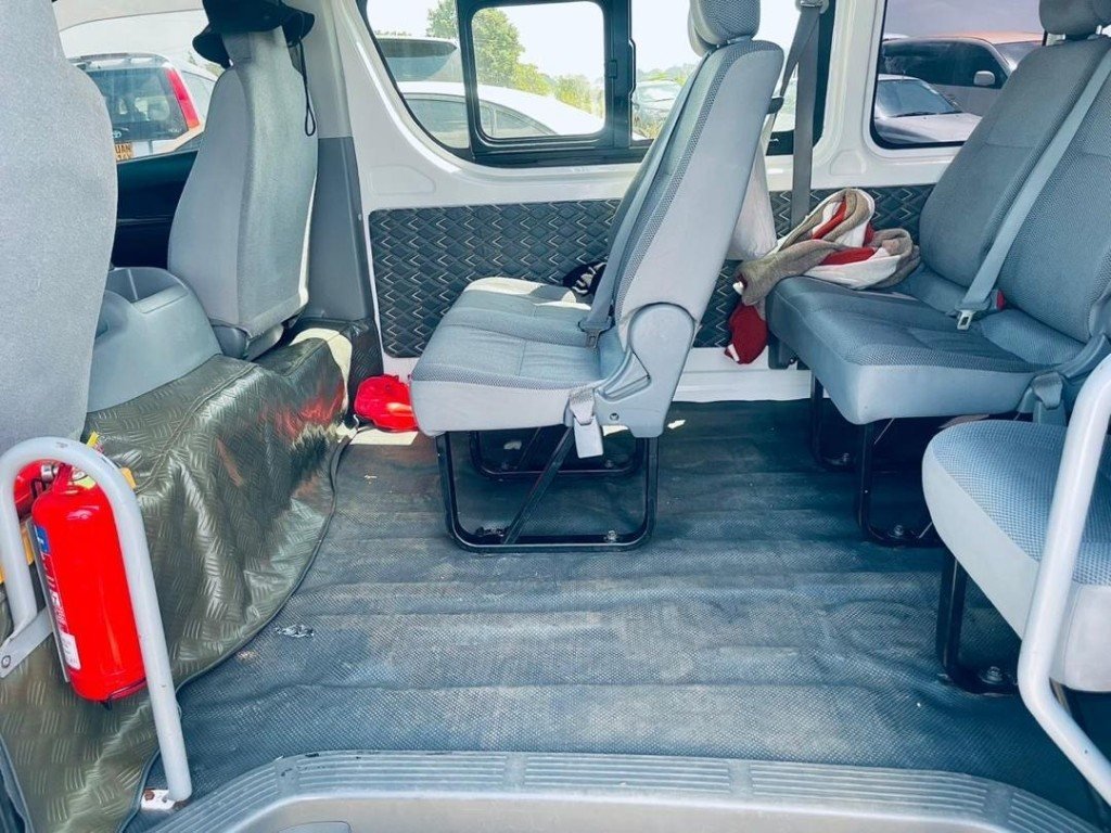Clean passenger van interior ready for group hire