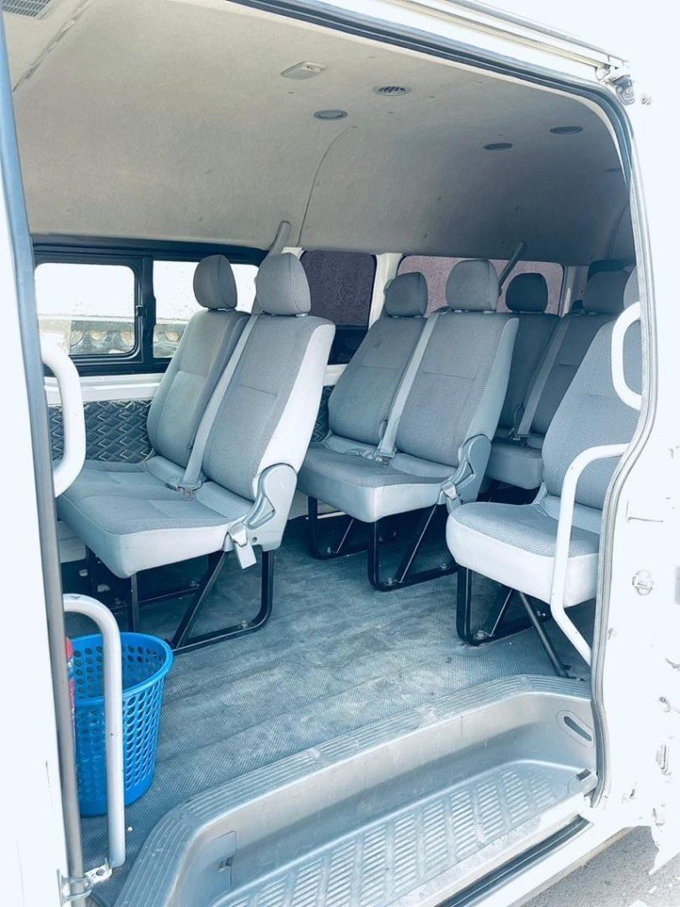 Van interior with seatbelts and air vents